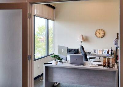 Sunny and light office space with light furniture